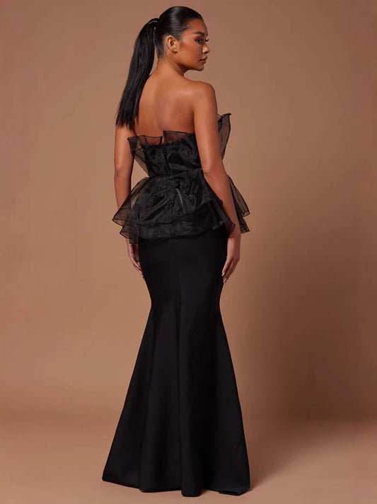 A cinched waist and strapless dress