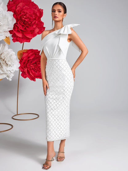 Vestido de malla con lentejuelas y lazo