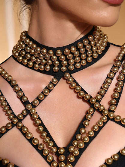 Vestido Mimu vendaje de manga larga con abalorios